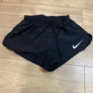 Black Nike track shorts